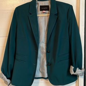 Emerald green two button blazer with striped silk interior